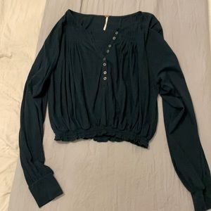 Crop length dark green blouse